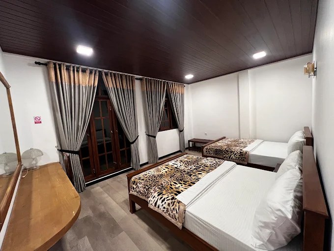 Family Room with two large beds at Pro Max Villa